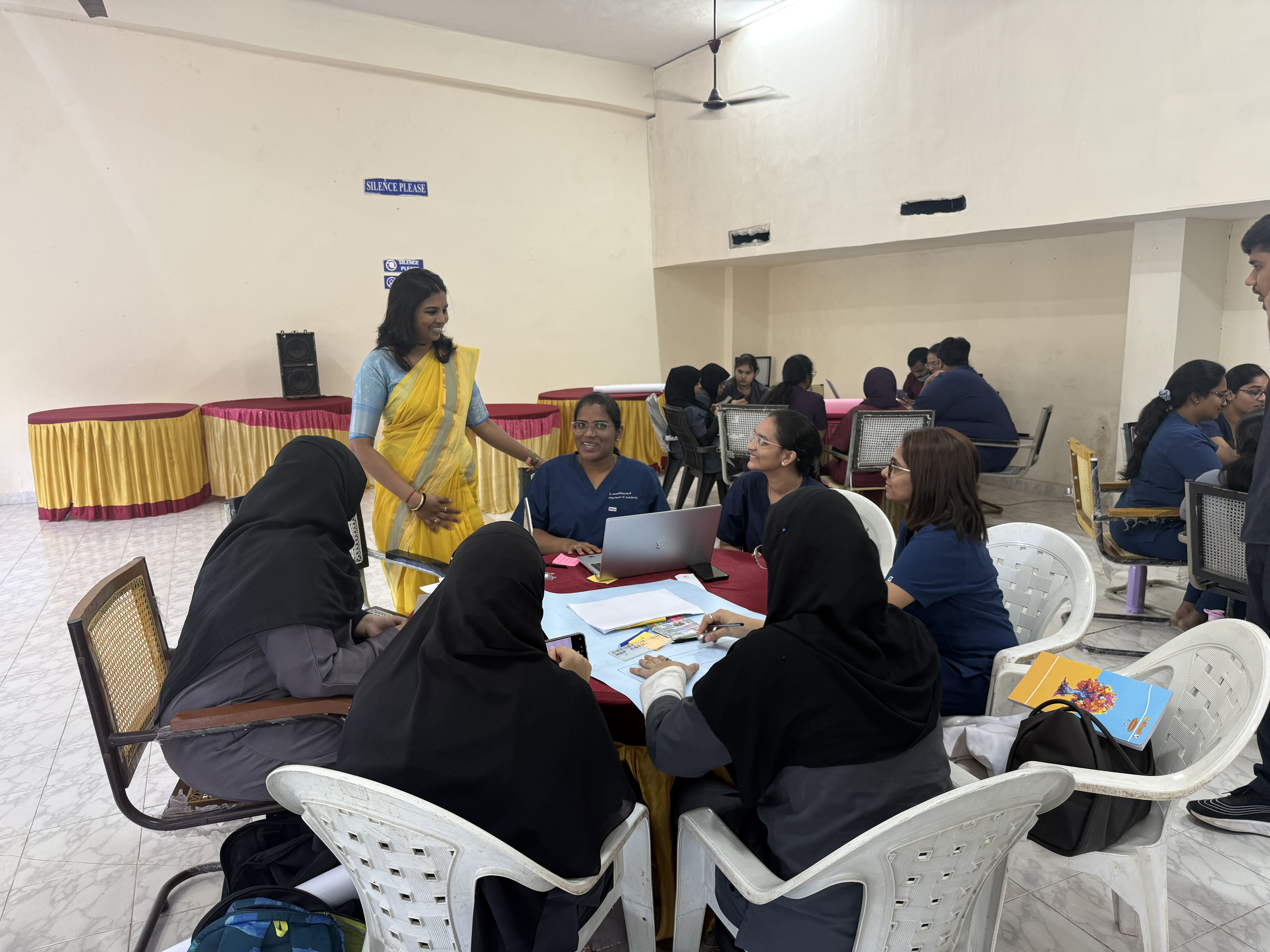 Dr. Raga with women students