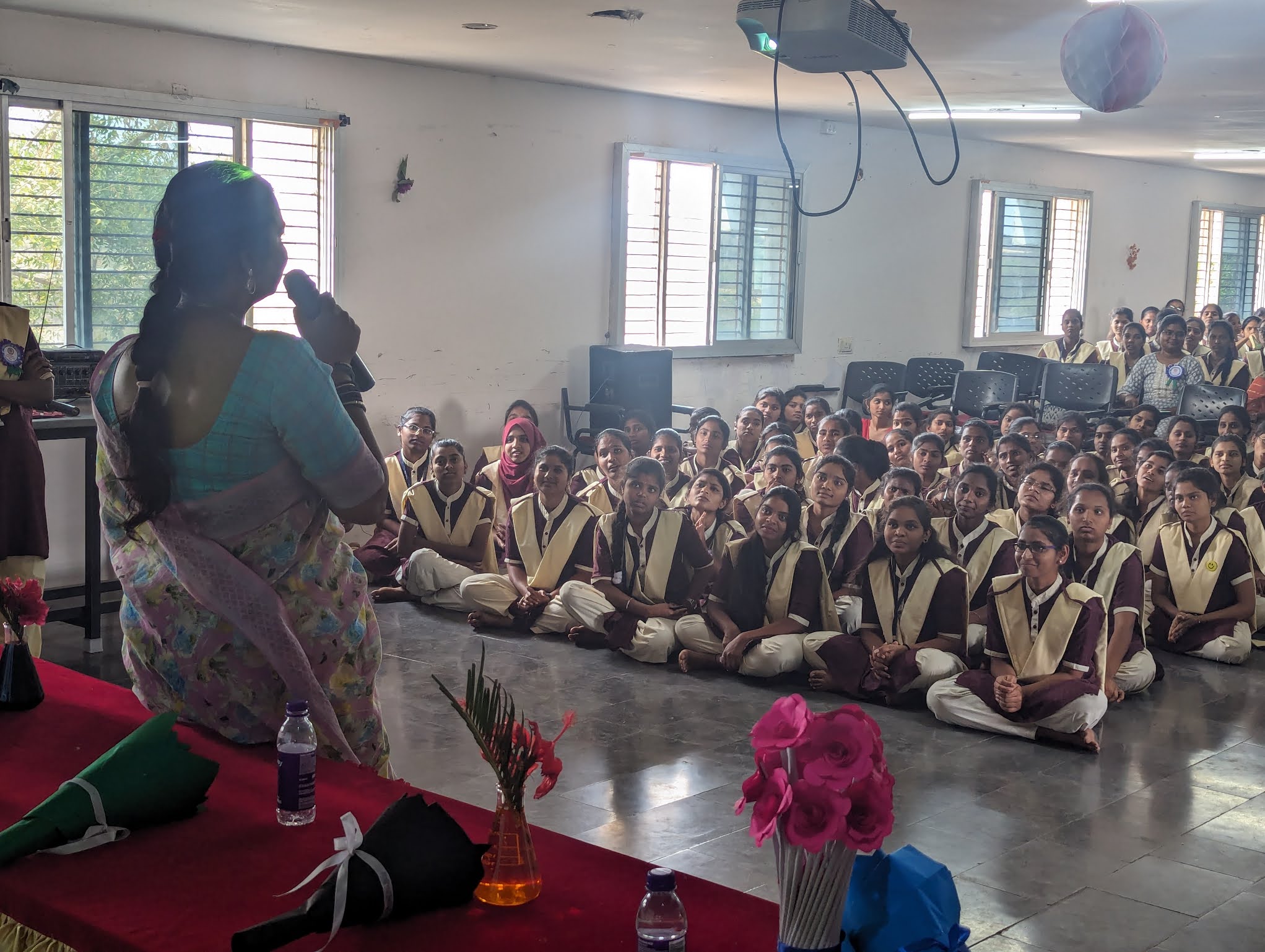 Dr. Raga addressing women